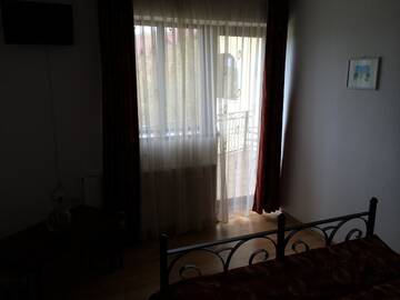 Фото номера Двухместный номер с 1 кроватью и балконом Гостевой дом Pensiunea Ego Residence г. Бран 2