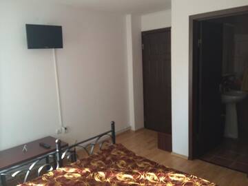 Фото номера Стандартный двухместный номер с 1 кроватью Гостевой дом Pensiunea Ego Residence г. Бран 4