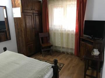 Фото номера Двухместный номер с 1 кроватью Гостевой дом Pensiunea Cerbul Carpatin г. Бран 17