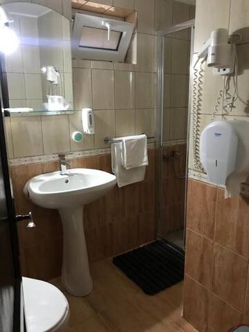 Фото номера Двухместный номер с 1 кроватью Гостевой дом Pensiunea Cerbul Carpatin г. Бран 20