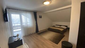 Фото номера Двухместный номер с 1 кроватью Гостевой дом Casa Cenţiu г. Бран 6