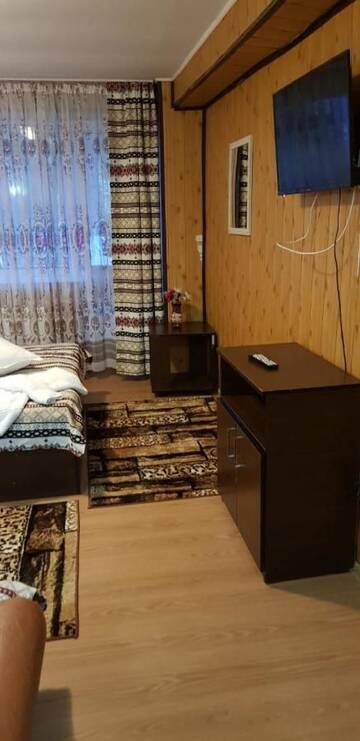 Фото номера Четырехместный номер Делюкс Гостевой дом Vila Muntii Bucegi г. Бран 3