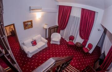 Фото номера Улучшенный двухуровневый люкс Отель Hotel Emire г. Бран 5
